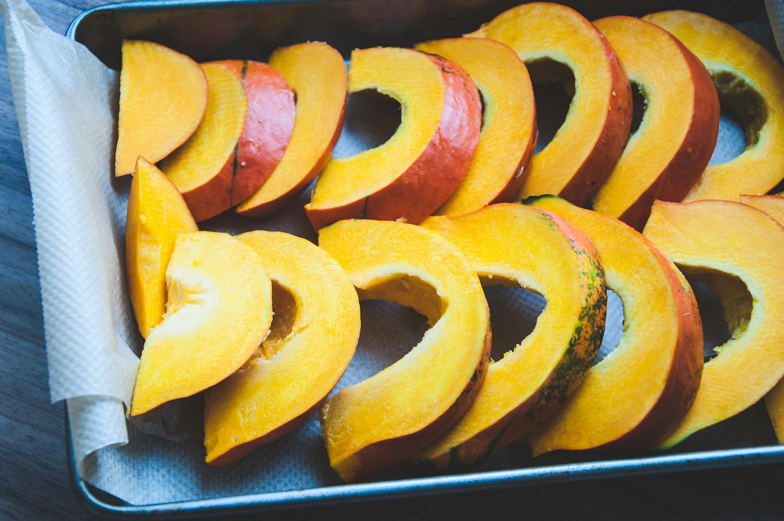 sliced fruit on black tray