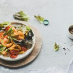 vegetable salad on white ceramic plate